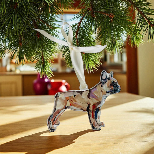 french bull Dog-shaped ornament hanging on a Christmas tree branch