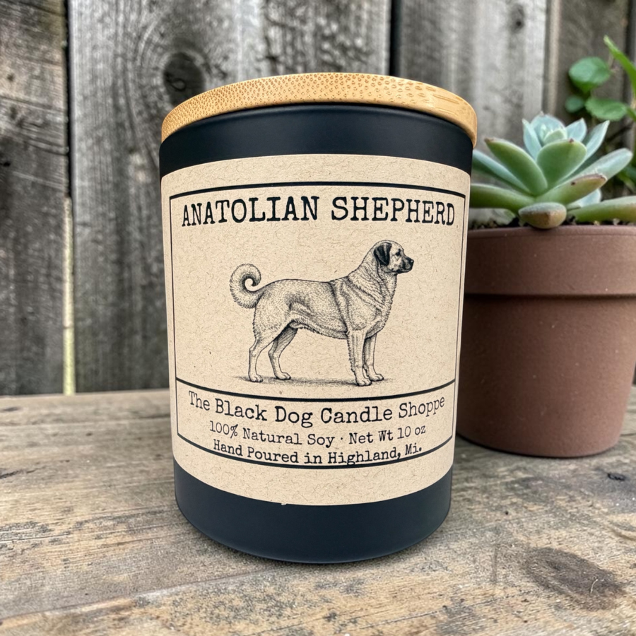 Anatolian Shepherd dog breed candle in matte black 10 oz jar with bamboo lid, featuring vintage engraving style label, hand-poured soy candle by The Black Dog Candle Shoppe