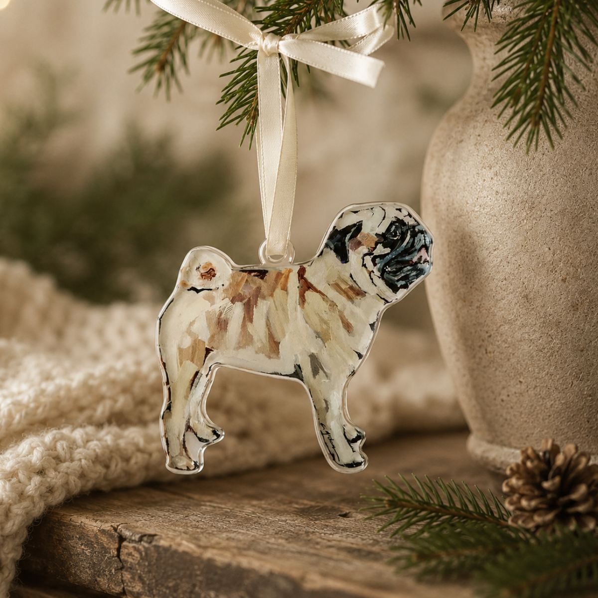 Premium acrylic ornament featuring a watercolor-style illustration of a fawn Pug with a black mask, finished with a cream satin ribbon. A thoughtful Christmas ornament and keepsake gift for Pug lovers and dog owners.